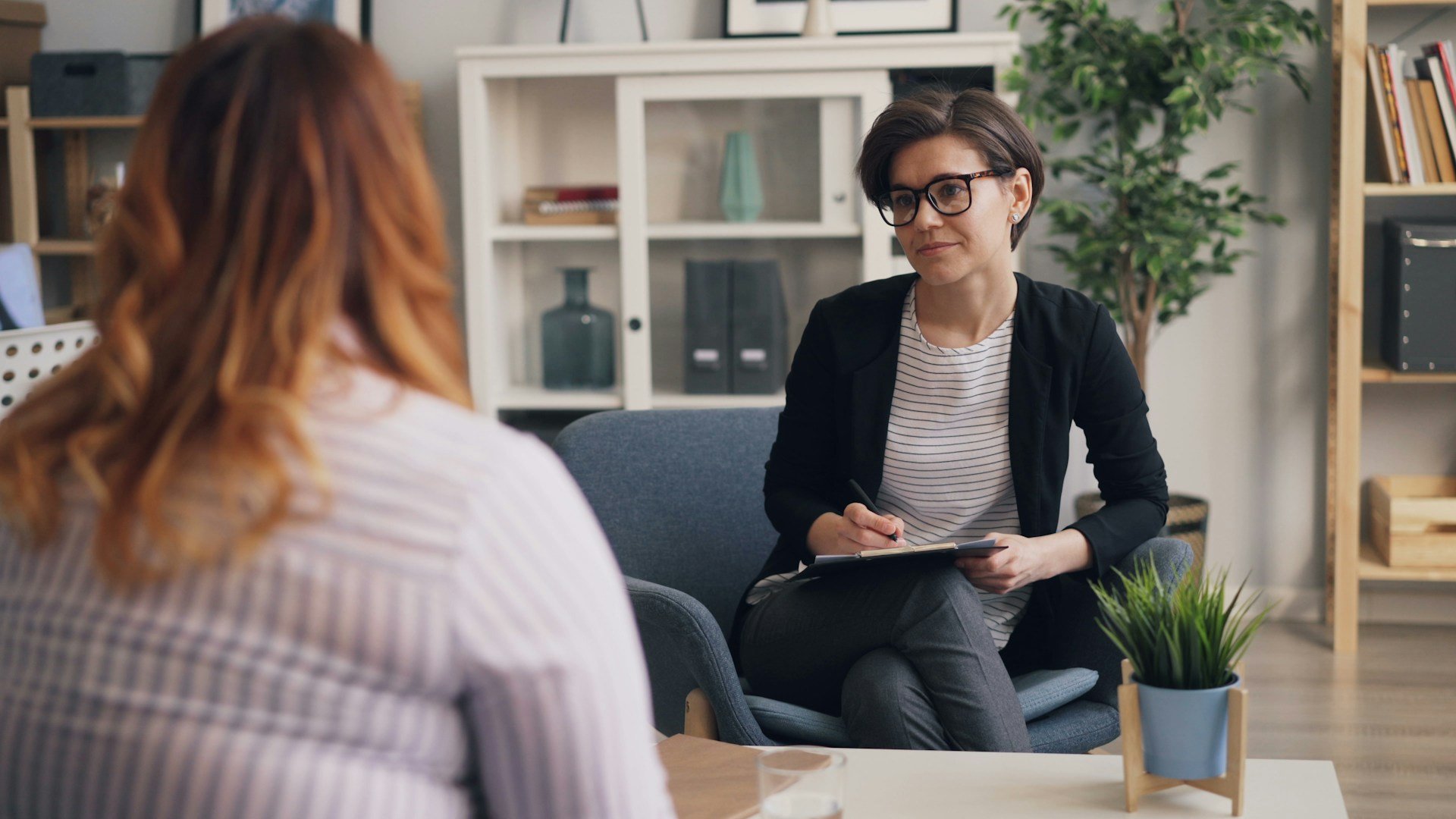 Image of Woman Seeking Promotion with Manager